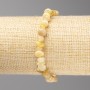 Náramek z žlutého jadeitu, facetované korálky, průměr 8×4 mm ±, na elastické šňůrce, délka 18 cm+