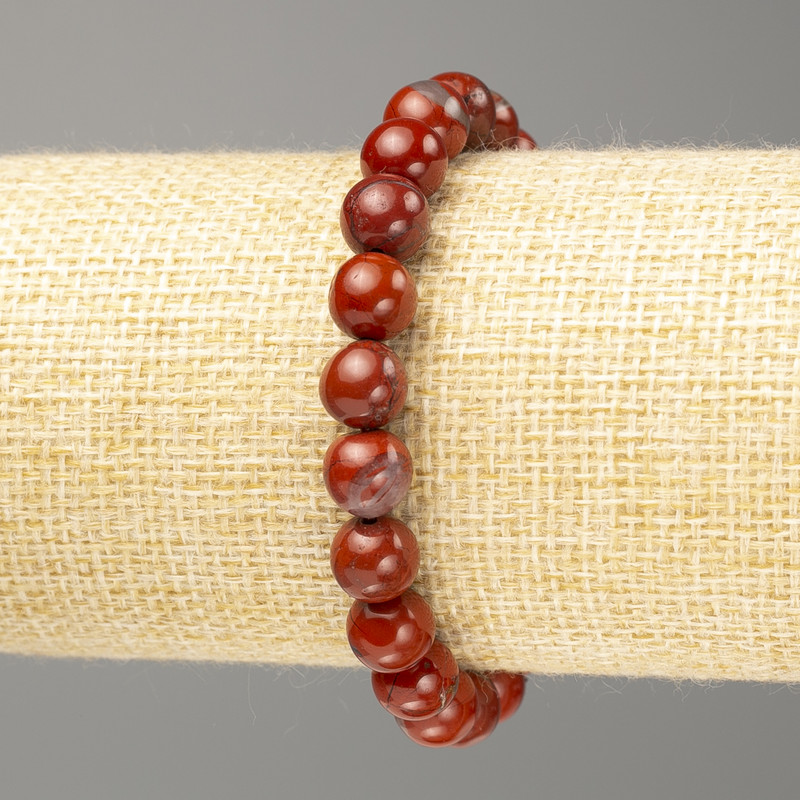 Náramek z červeného jaspisu, hladké korálky o průměru cca 8,5 mm, délka 18 cm (elastická šňůra)
