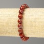 Náramek z červeného jaspisu, hladké korálky o průměru cca 8,5 mm, délka 18 cm (elastická šňůra)