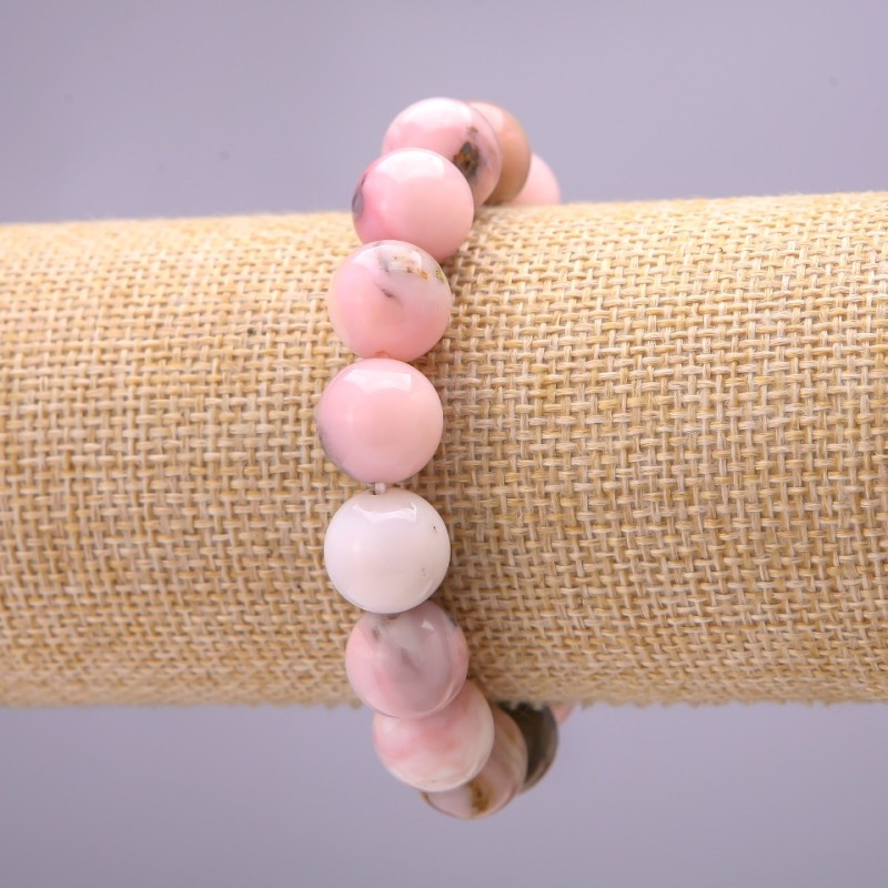 Náramek z přírodního kamene, růžový opál, hladká kulička, průměr přibližně 10 mm, na elastické gumě, obvod 18 cm