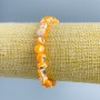 Náramek z perleti, světle oranžové galetové korálky, průměr 8×6 mm, délka 18 cm (elastický)