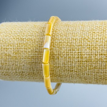 Náramek z béžové perleti, cylindrického tvaru, průměr 4,5×10 mm, délka 18 cm (elastický)