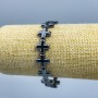 Náramek hematit Kříž, průměr 12,5×12,5×4 mm ±, délka 18 cm (elastický)