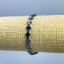 Náramek z hematitu „Kříž“, průměr 8×6 mm, délka 18 cm (elastický)