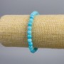 Náramek z akvamarínu, světle modré hladké kuličky, průměr cca 6 mm, délka 18 cm, elastický