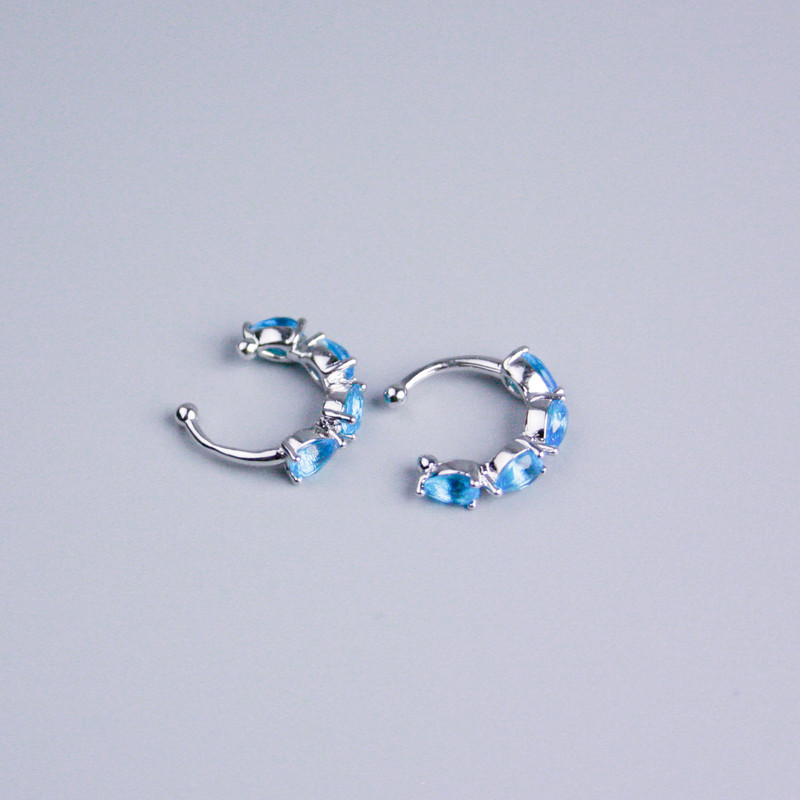 Náušnice na klipsy Xuping rhodiované se světle modrými štrasemi 13×3 mm +