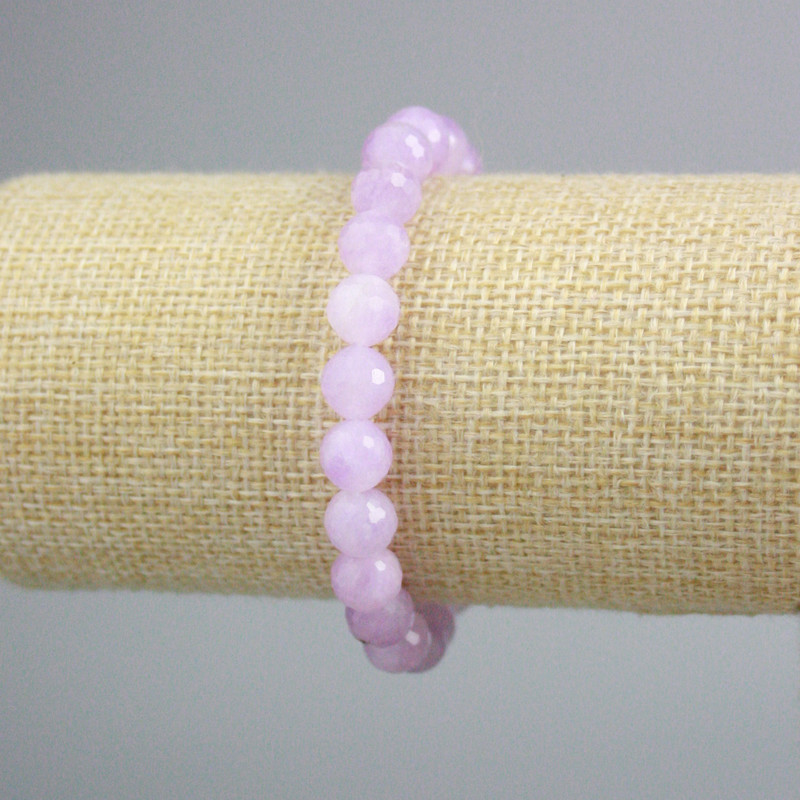 Náramek z kunzitu, facetované kuličky, průměr cca 8,5 mm, délka 18 cm ± (elastický)