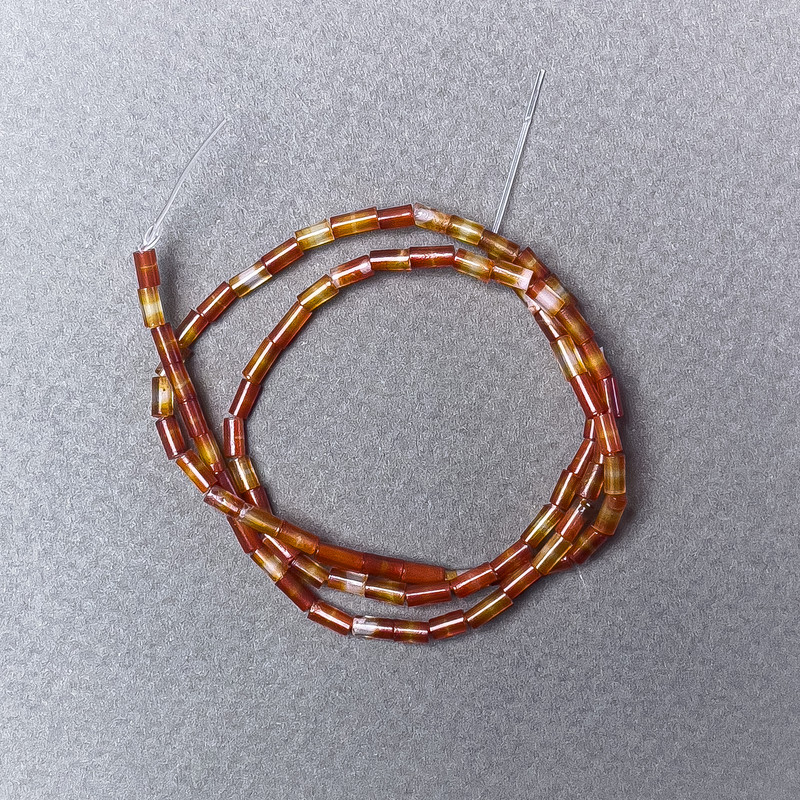 Korálky karneolu, přírodní, broušené, 2×5 mm ±, délka 38 cm ± na niti