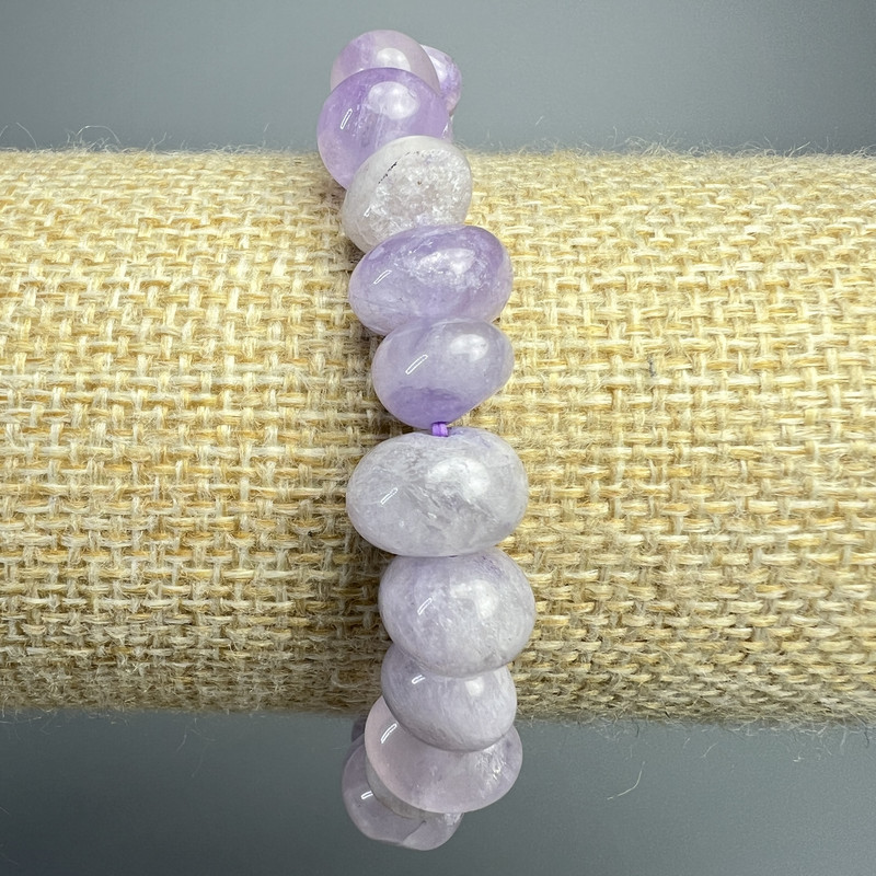 Náramek levandulový ametyst z přírodního kamene, fasetované korálky, průměr cca 10×7 mm, délka 18 cm ± (elastický)