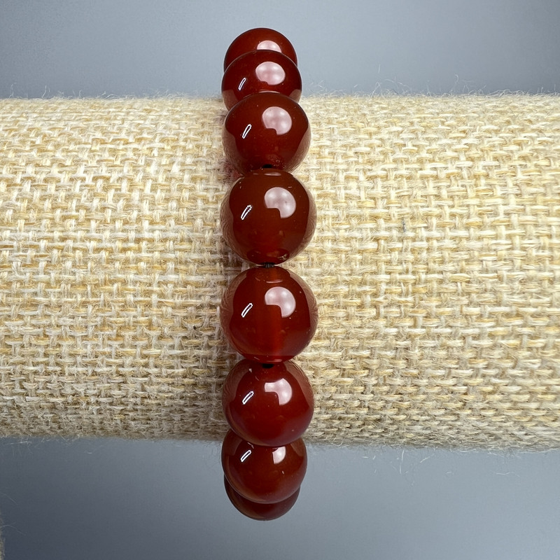 Náramek z karneolu, přírodní kámen, hladké kuličky, průměr 10 mm, délka 18 cm (elastický)