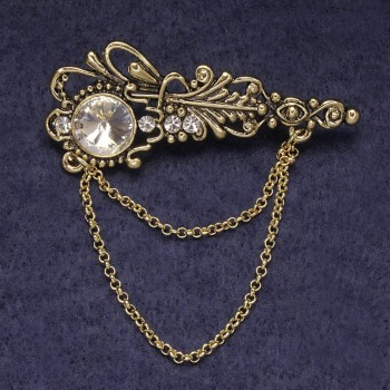 Brož Akcent s bílými kamínky a krystalem, zlatavý kov 55×22 mm