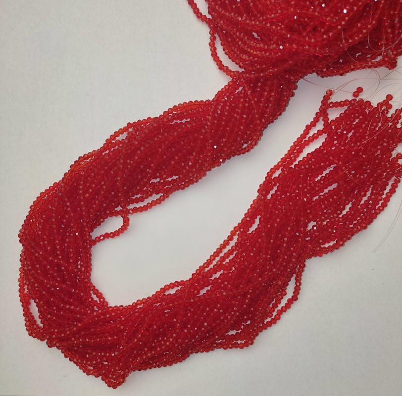 Korálky Český křišťál červené průhledné brusované rondely, průměr 3×2,5 mm, délka 39 mm ± na niti