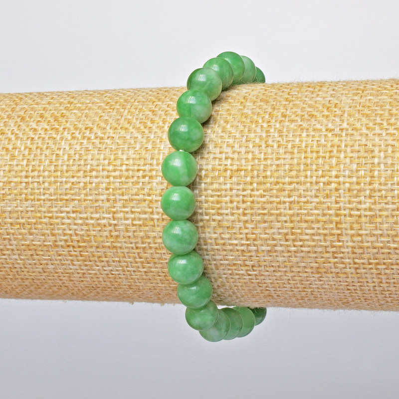 Náramek z chryzoprastu (tlačené) hladké kuličky, průměr 7 mm +-, délka 18 cm +- (strečový)