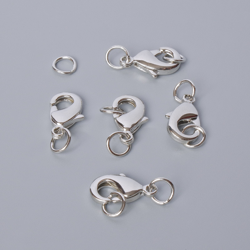 Karabinkové zapínání, průměr 15×8 mm, stříbrné barvy kovu, 1 ks