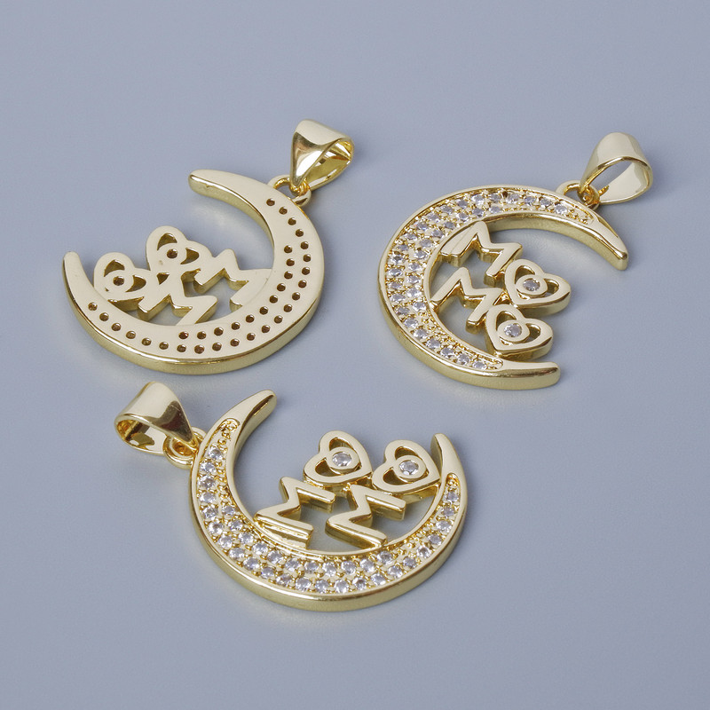 Přívěšek «Měsíc» se bílými štrasovými kamínky, zlatavý odstín kovu, průměr 26×17 mm