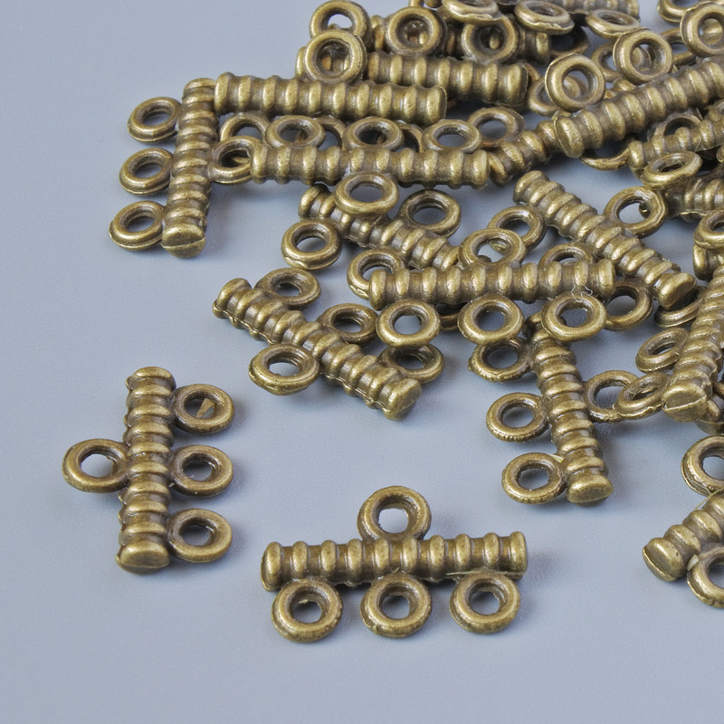 Konektor na 3 vlákna, rozměry 14×9 mm, průměr otvoru 1,8 mm, balení 30 ks ±, bronzová barva kovu