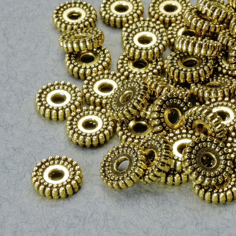 Kovová korálková vložka, rozměr 2×7 mm ±, otvor 1,8 mm, zlatistý odstín kovu, balení 36 ks