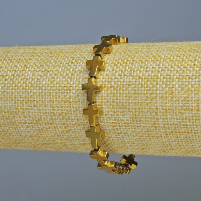 Náramek z hematitu «Kříž» zlatavé barvy, průměr 9×7×1,5 mm, délka 18 cm +- (elastický)