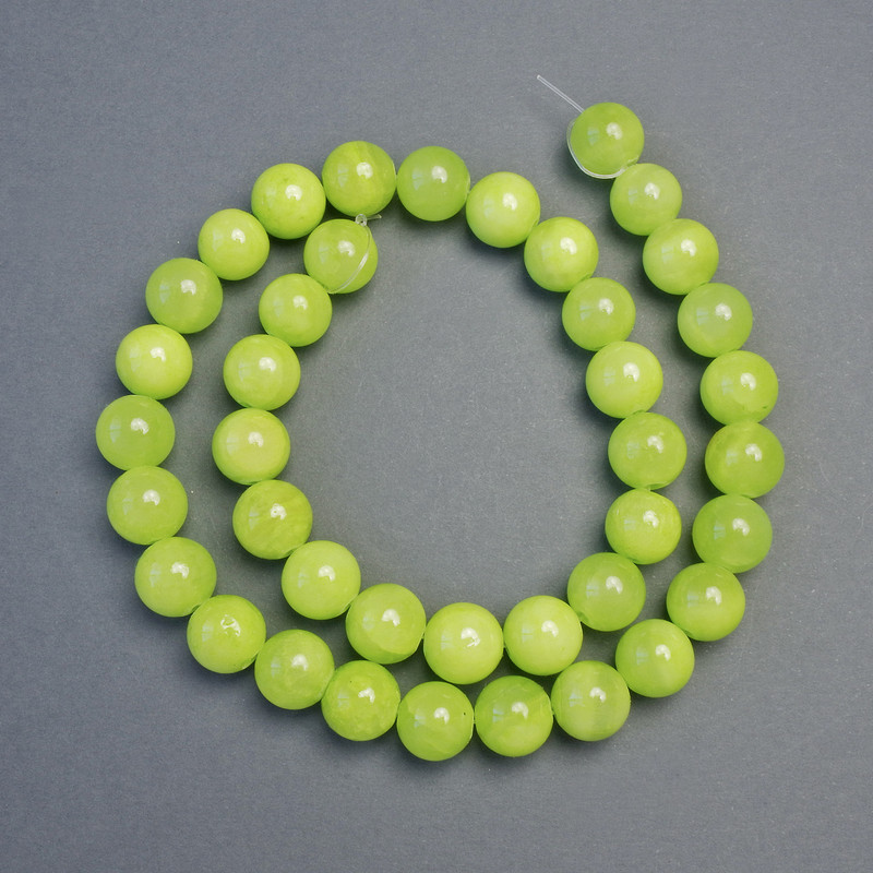 Korálky z onyxu hladké kuličky (lisované), průměr 10,5 mm, délka cca 39 cm, na vlascu