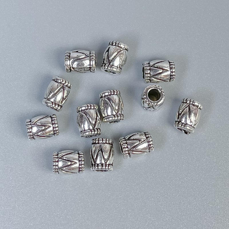 Korálka-vložka, barva kovu stříbrná, průměr 4,5×6 mm ±, otvor 2 mm ±, balení 36 ks