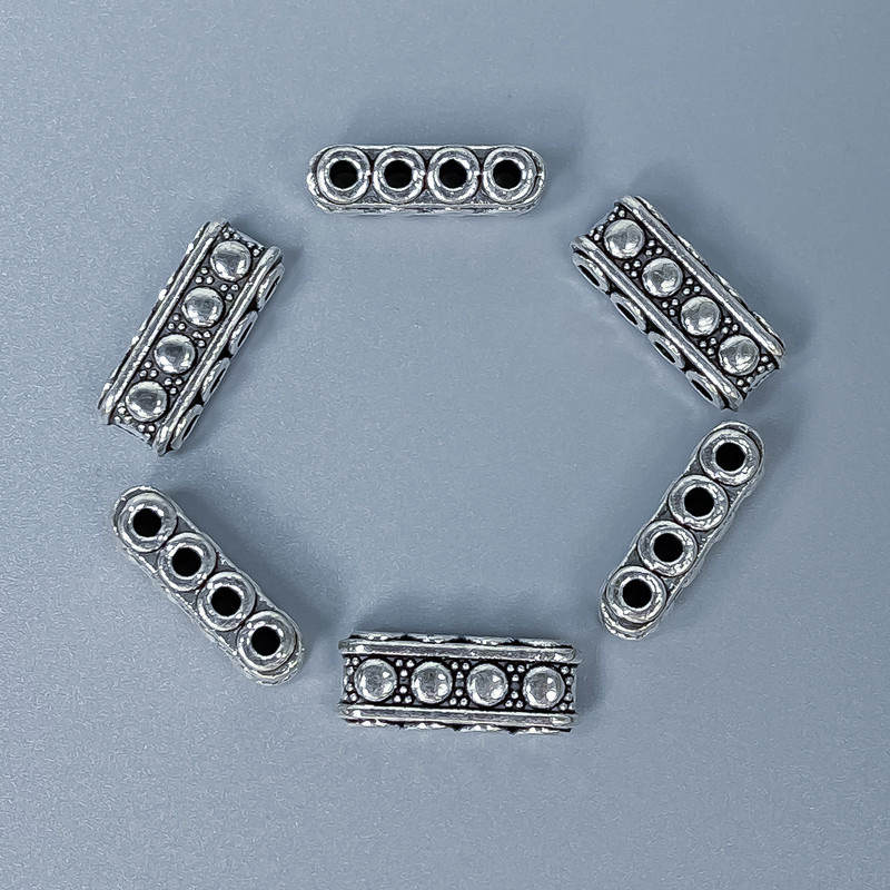 Rozdělovací díl řad, vložka, barva kovu stříbrná, průměr 7×5×17 mm, ± otvor 1,8 mm, ± balení 20 g (~10 ks)