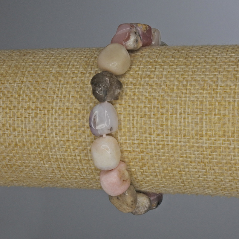 Náramek z růžového opálu, fasetovaný, průměr 8–12×10 mm, délka 18 cm, elastický