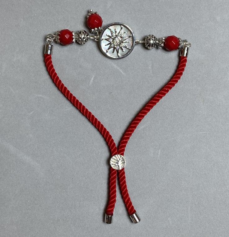 Браслет текстиль, діаметр 5, 5мм+- на затягувані Корал гранована кулька 8мм+- з металевою вставкою, діаметр 17мм+- сріблястий метал