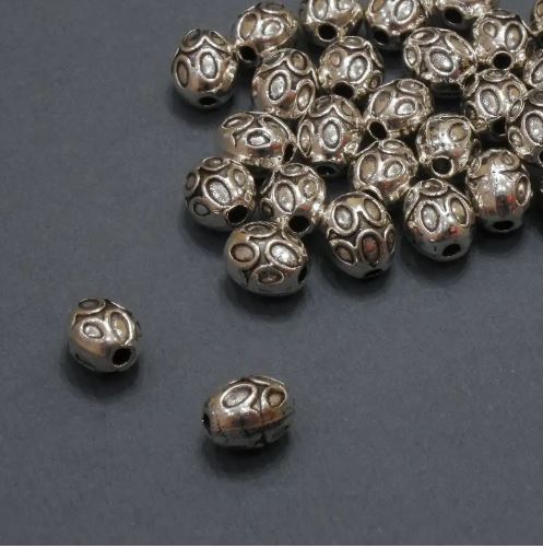 Korálka-vložka vnitřní, průměr 1,5 mm ±, průměr 5,5×7 mm ±, balení 20 g, 28 ks (±)