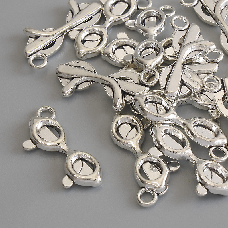 Přívěšek „Brýle“ – stříbrný kov, průměr 23×9 mm, balení 15 ks