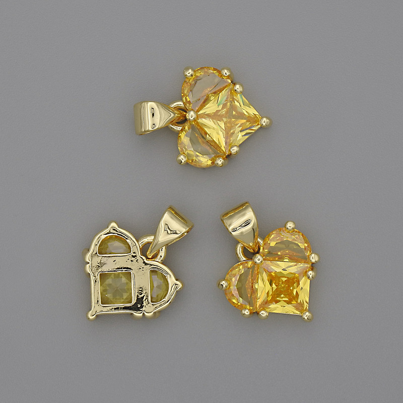 Přívěšek ve tvaru srdce se žlutými krystaly 12×12 mm ±, délka 17 mm ±, zlatistý kov