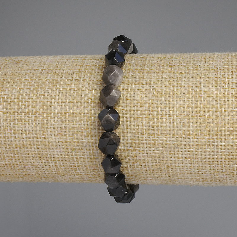 Náramek z přírodního obsidiánu se stříbřitými fasetami, průměr 8×7 mm, délka 18 cm ±