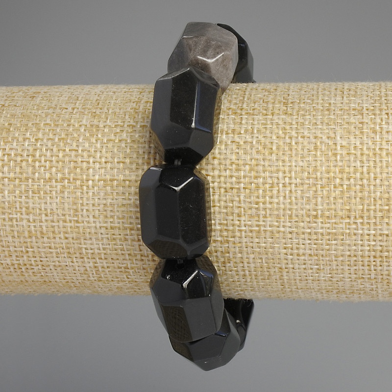 Náramek z obsidiánu – stříbrný, víceúhelníkové fasety, průměr 20×15–16 mm ±, délka 18 cm