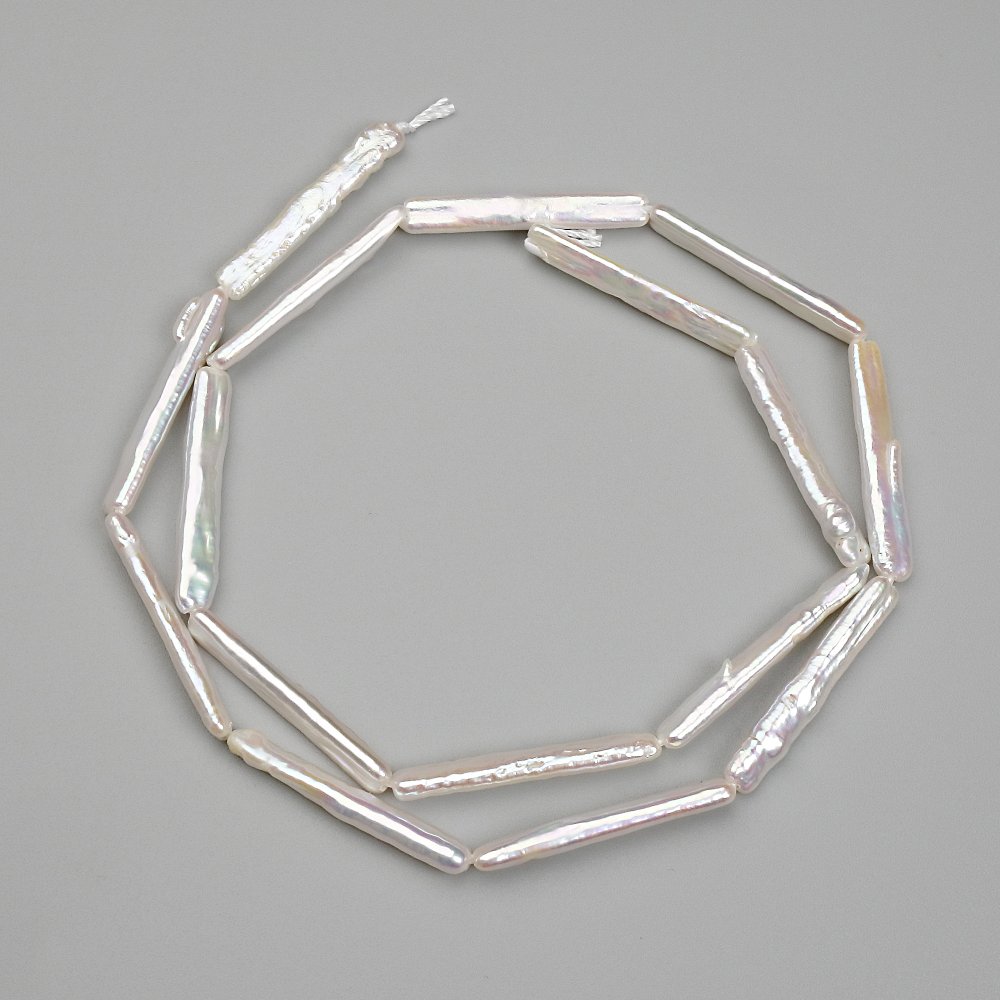 Barokní perlové korálky s odstínem «benzín» 25×4 mm, délka 39 cm