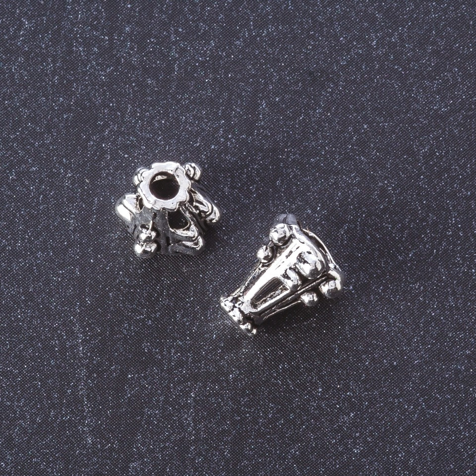 Koncovka, barva kovu „stříbro“, délka 10 mm, balení 20 g ± 24 ks