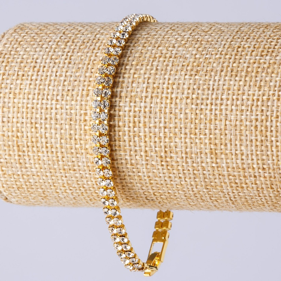 Náramek s kamínky na zapínání, dvouřadý, zlaté barvy kovu, délka 19 cm, šířka 5 mm