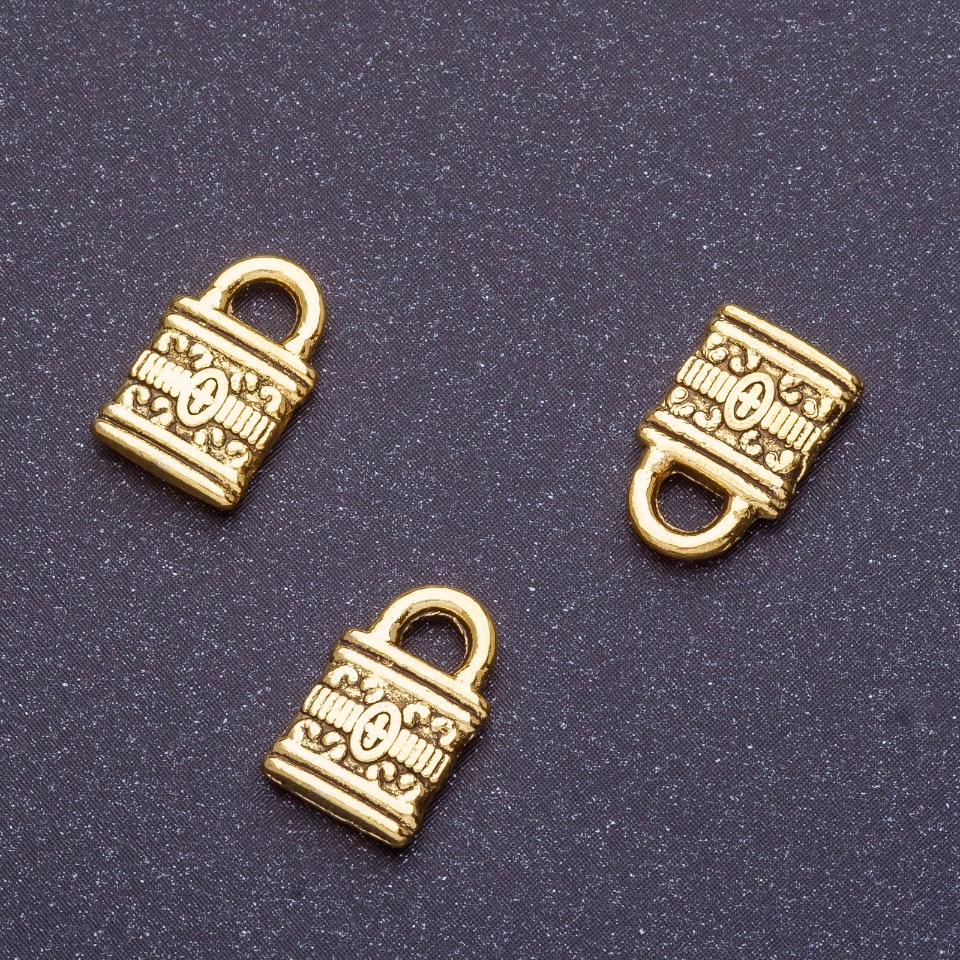 Kovová závěsná součástka – zámek, délka 12 mm, Ø 5 mm, barva starozlatá, povrchová úprava: 18 ks