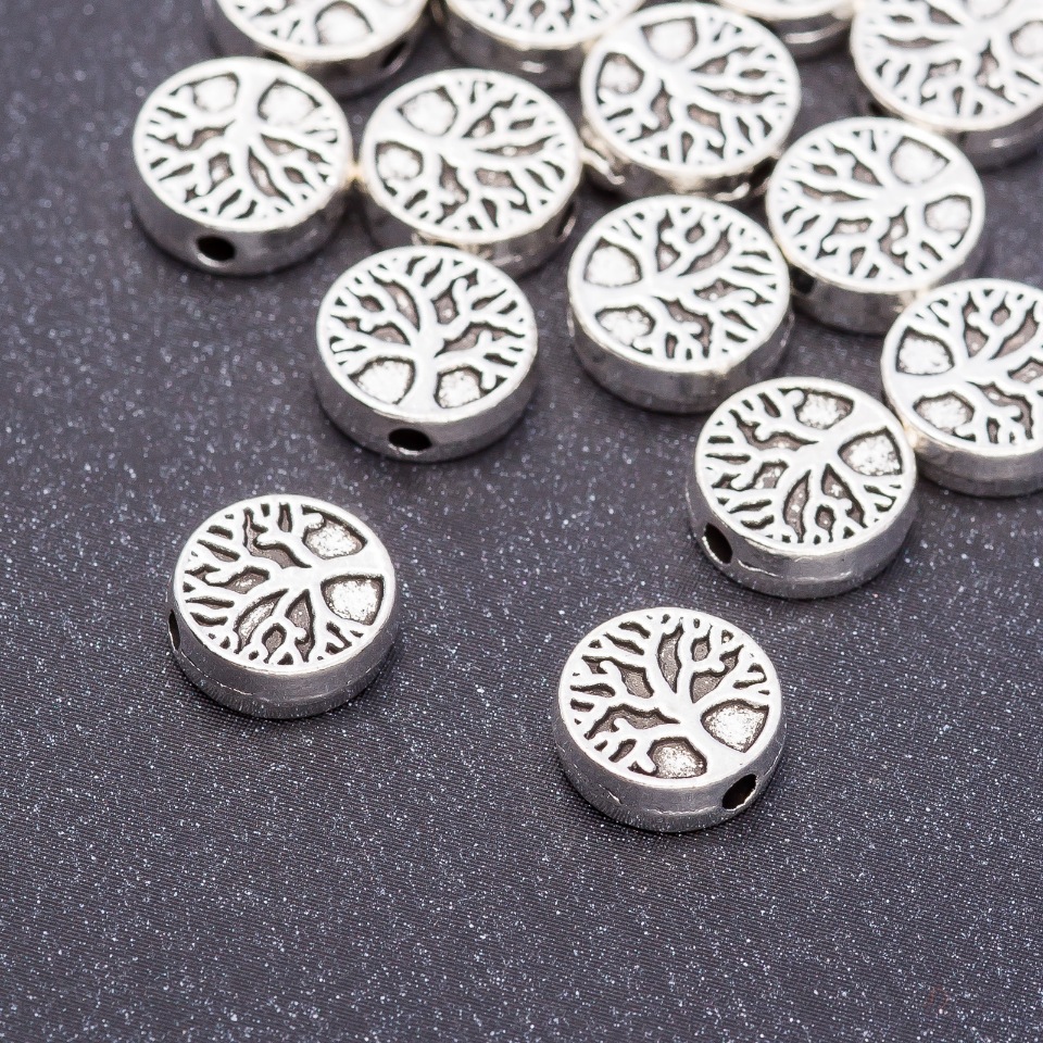 Kovové komponenty – korálka-vložka, dřevo, průměr 9×3 mm, otvor, balení 20 g ± 17 ks