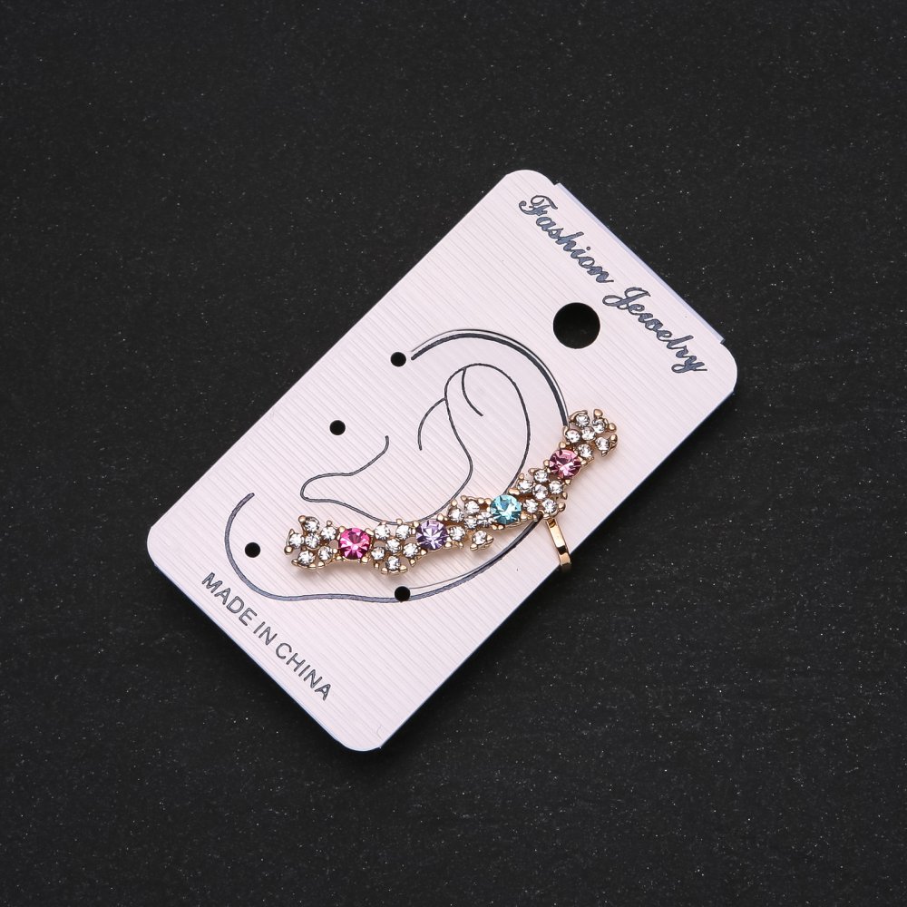 Zlaté klipsové náušnice na ucho s bílými květy a různobarevnými kamínky