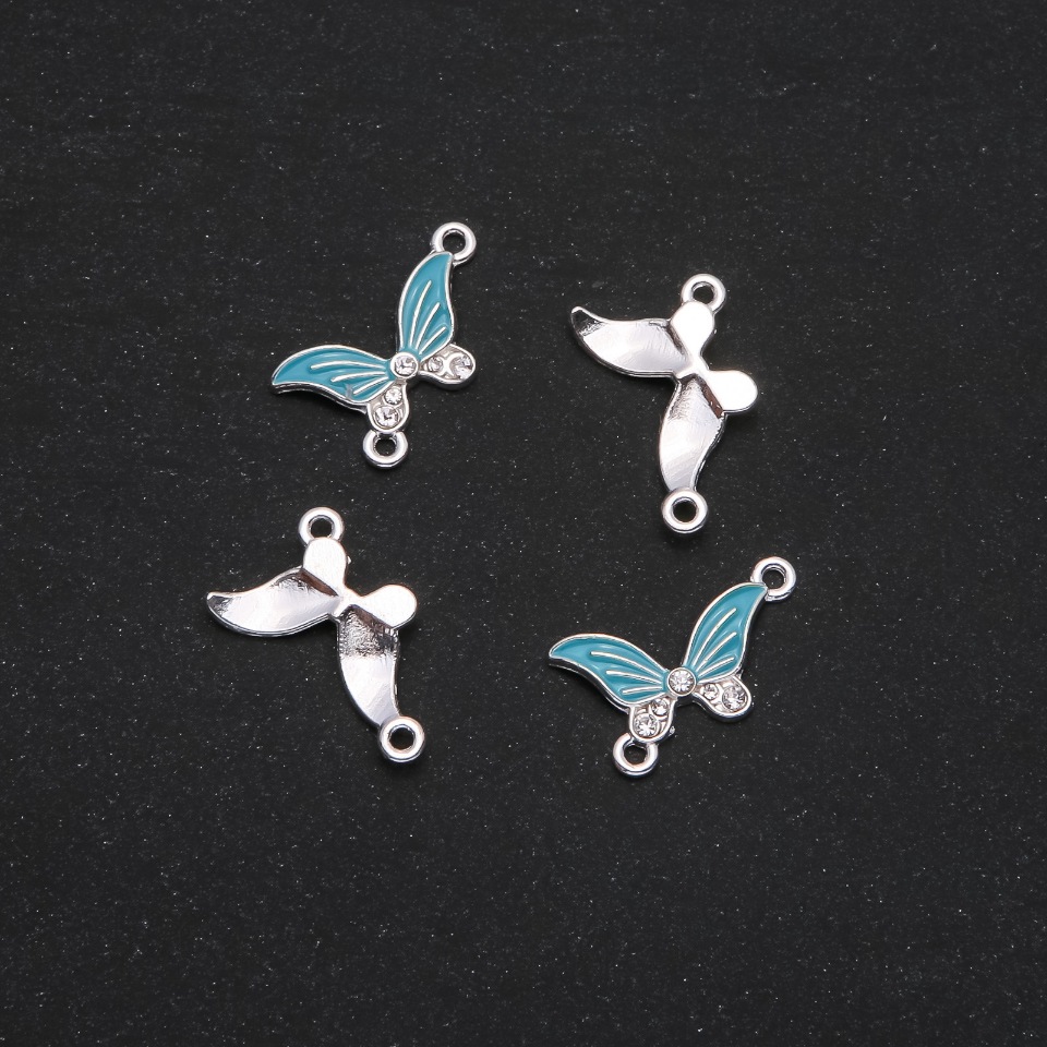 Kovové komponenty – Konektor Motýl s modrým smaltem 24×12 mm, balení 4 ks