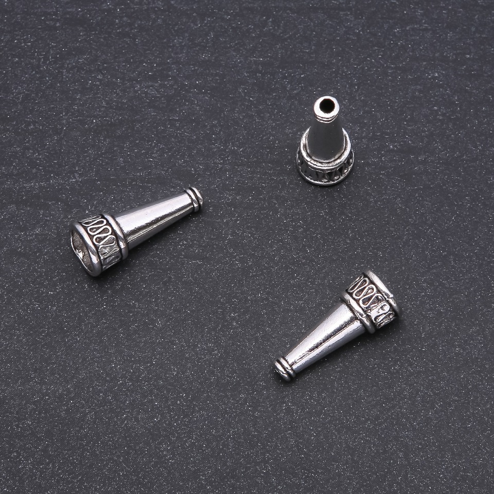 Kovová koncovka 23 mm, balení 20 g, ± 10 ks