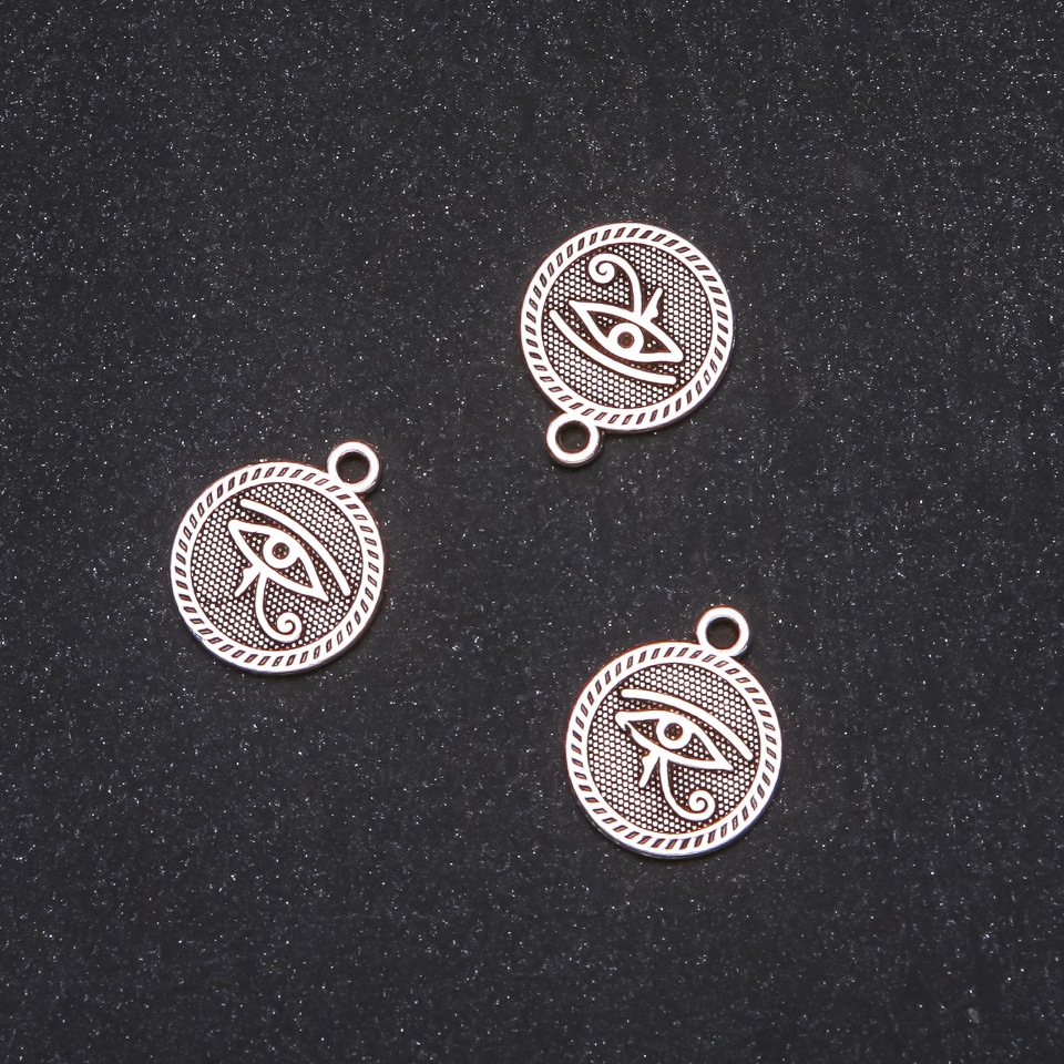 Přívěšek Oko egyptské, 15×18 mm, balení 20 g ±12 ks