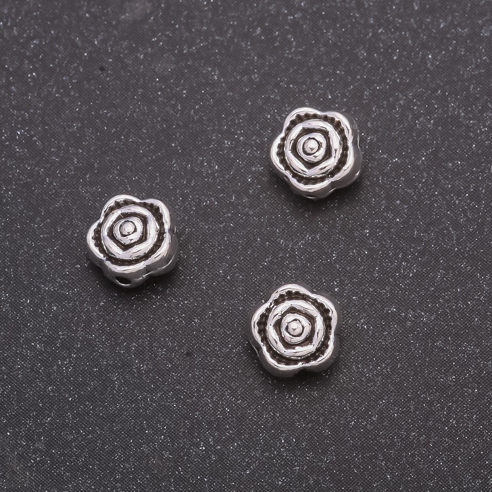 Korálek-vložka, průměr 7×4 mm, průměr dírky 1 mm, balení 20 g, ±38 ks
