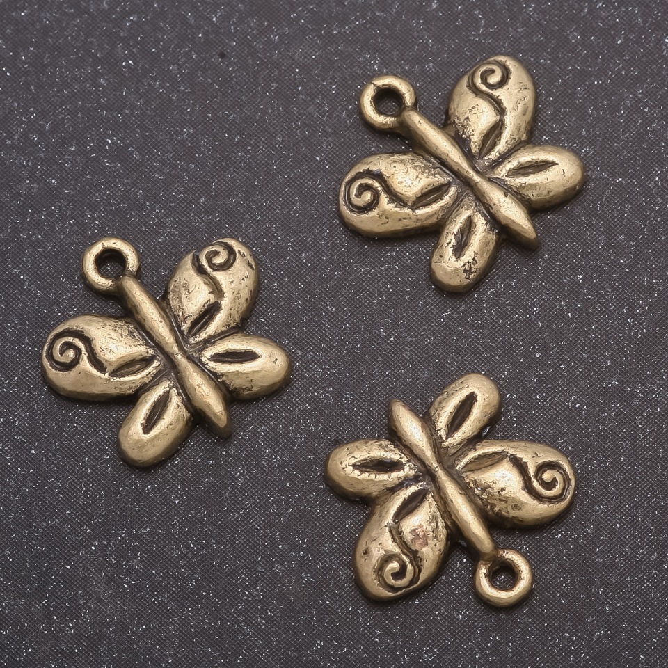 Kovové komponenty pro šperky – Přívěšek Motýl (bronz), průměr 13×13 mm, díra 1,5 mm, balení 20 g ±22 ks