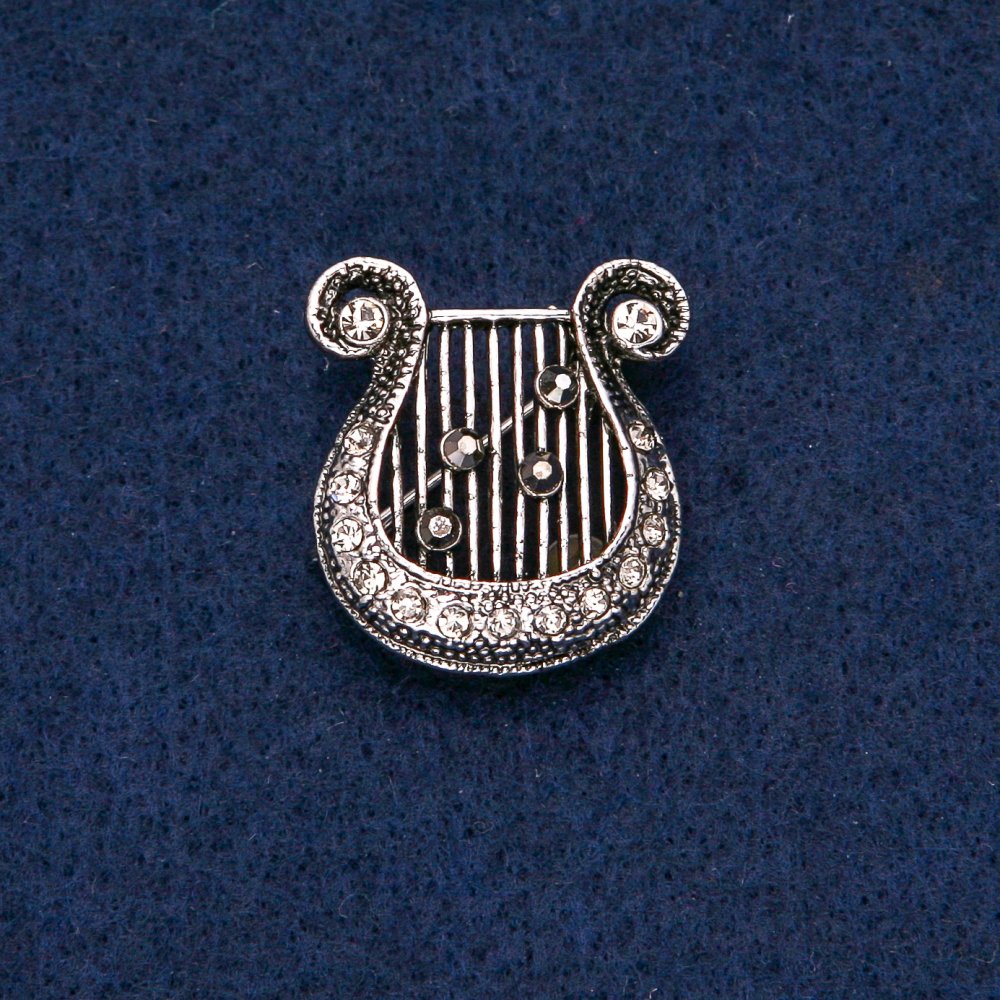 Brož Líra 25 × 23 mm s tmavými štrasami a tmavým kovem
