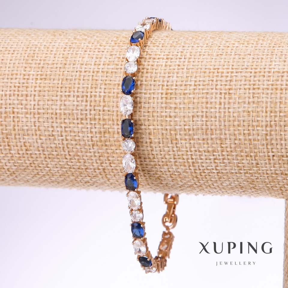Náramek Xuping se bílými a modrými kameny, tloušťka 4,5 mm, délka 18–21 cm, s pozlacením 18k