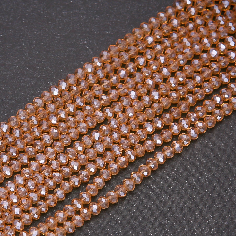 Korálky Český křišťál průhledné šampaň s benzínovým nástřikem, tvaru rondele, průměr 3,5×3 mm, délka niti 38 cm