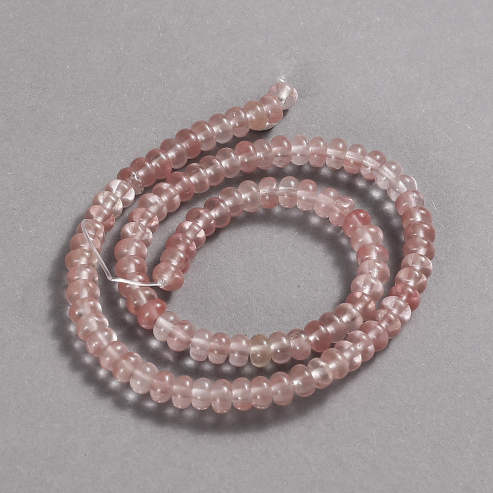 Korálky chalcedonu na niti, průměr 6×4 mm, délka 39 cm