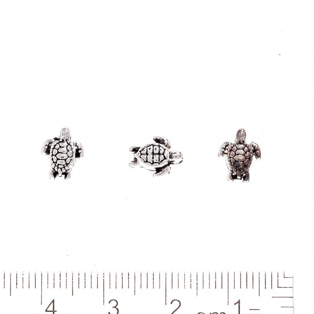 Kovové komponenty – korálka mořská ve tvaru mušle, otvor 1 mm, barva kovu «stříbro», balení 20 g ± 38 ks