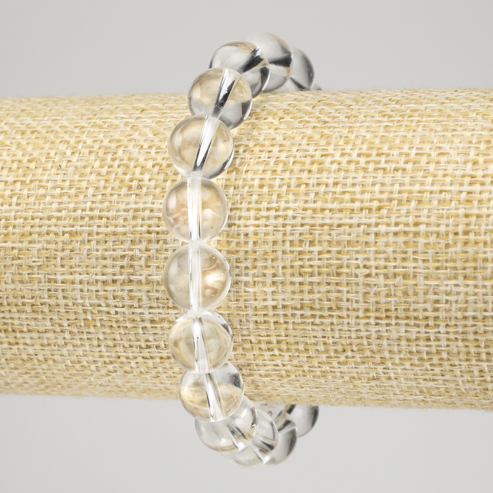 Náramek na gumičce z horského křišťálu, hladká korálka, průměr 10 mm+