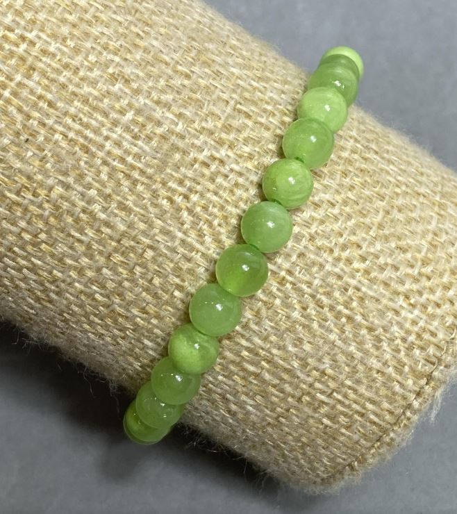 Náramek na gumičce z přírodního onyxu, hladká kulička, průměr 6 mm+